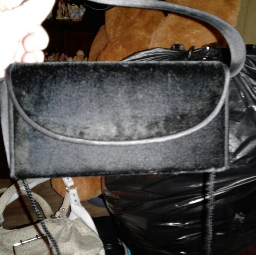 Small black makeup bag